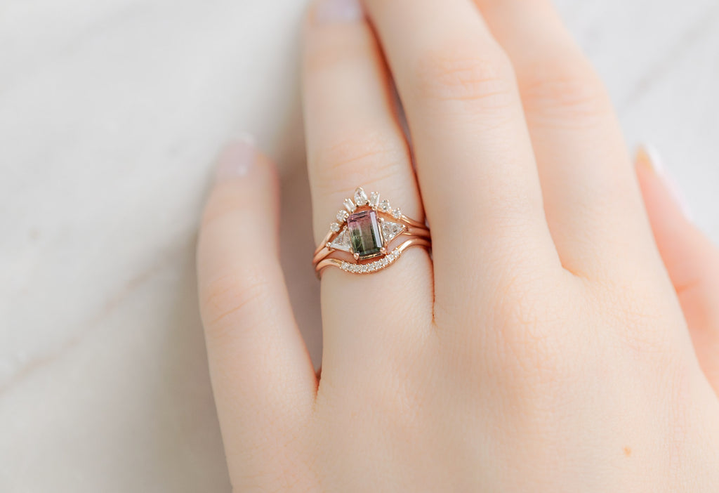 The Jade Ring with an Emerald-Cut Watermelon Tourmaline with White Diamond Stacking Rings on Model