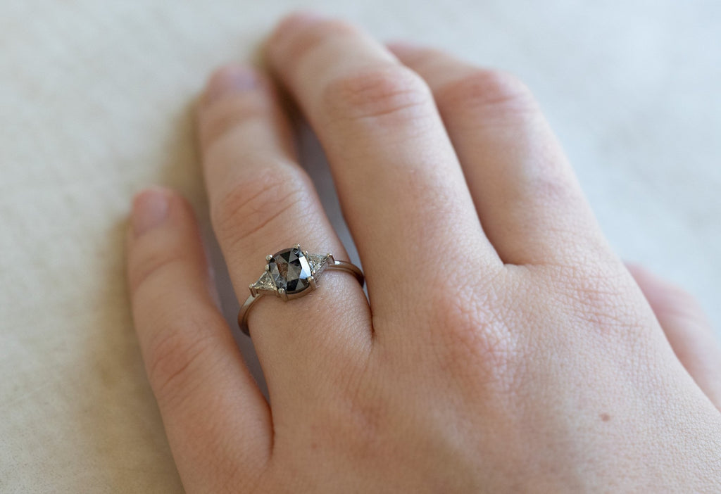 The Jade Ring with a Salt and Pepper Cushion-Cut Diamond on Model