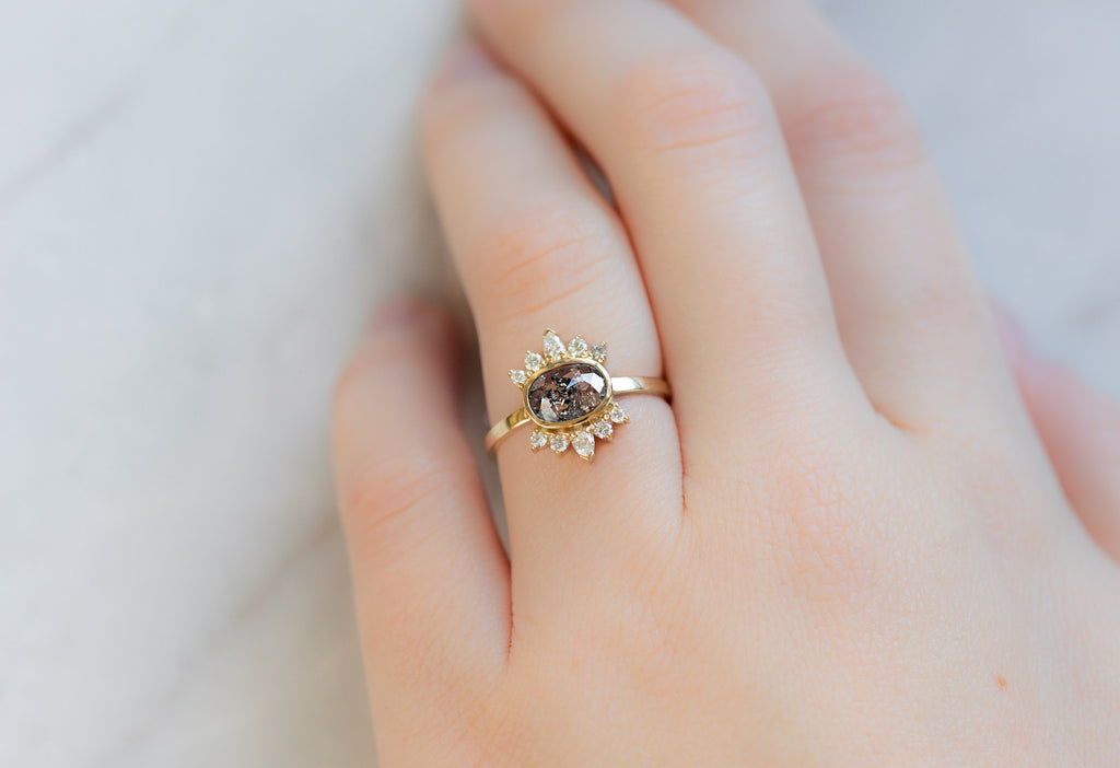 The Lotus Ring with an Oval-Cut Salt and Pepper Diamond on Model