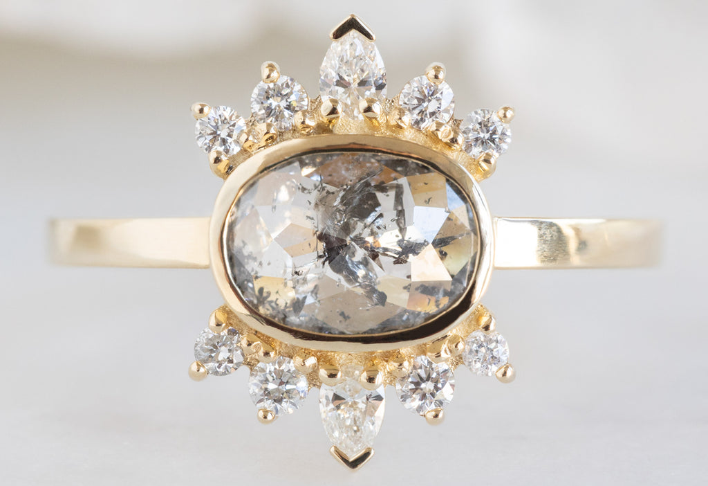 The Lotus Ring with an Oval-Cut Salt and Pepper Diamond
