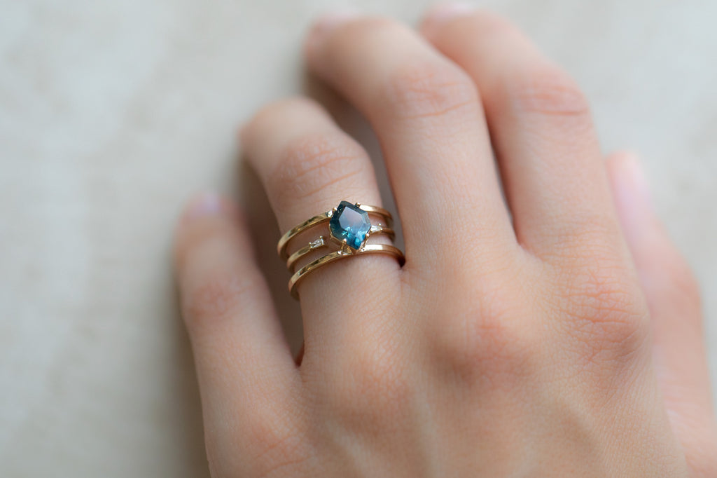 The Poppy Ring with a Montana Sapphire Hexagon with Stacking Band on Model