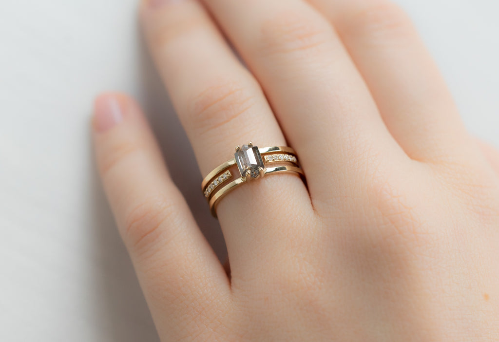 The Poppy Ring with a Salt and Pepper Hexagon Diamond with Open Cuff Pavé Staking Band on Model