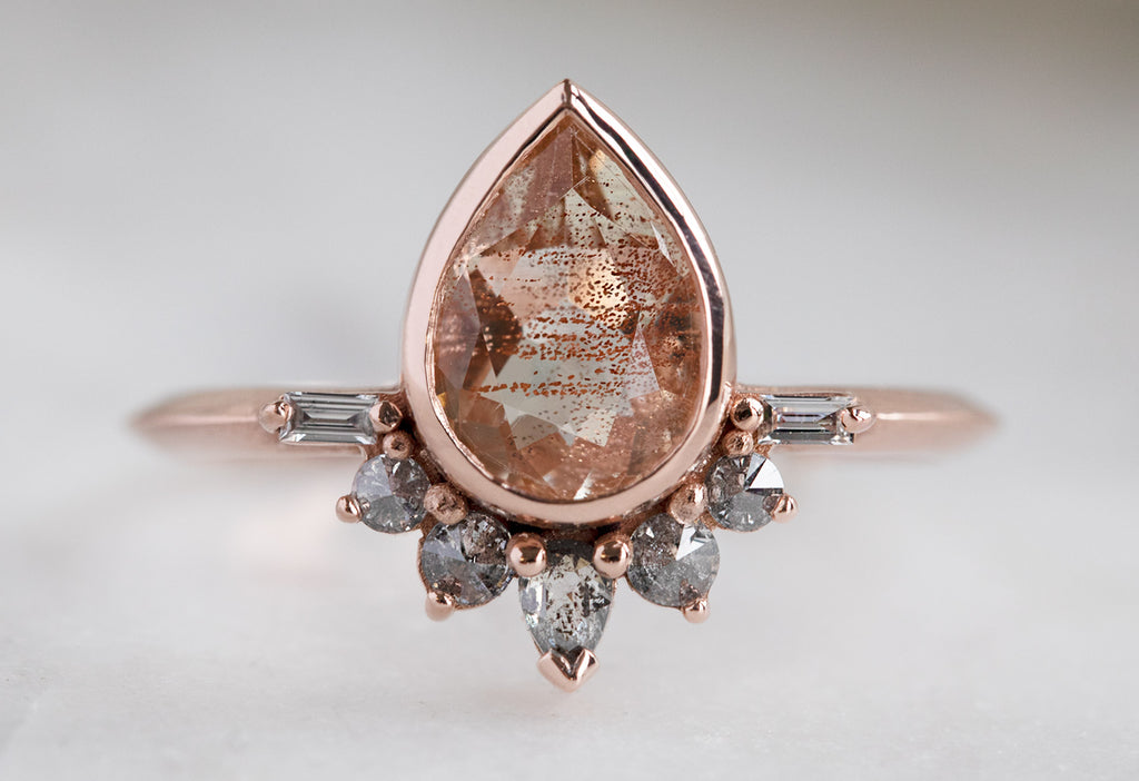 The Posy Ring with a Pear-Cut Sunstone