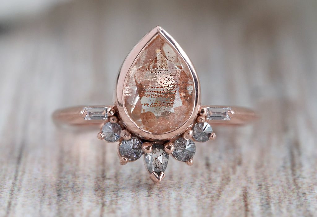 The Posy Ring with a Pear-Cut Sunstone