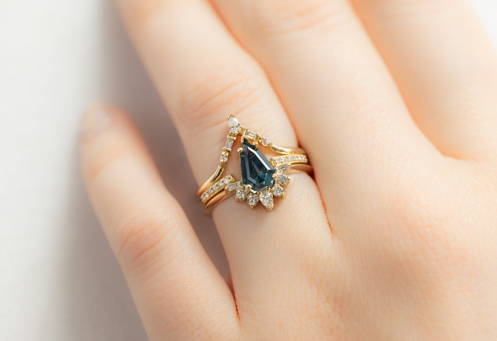 The Post Ring with a Geometric Sapphire with White Diamond Stacking Bands on Model