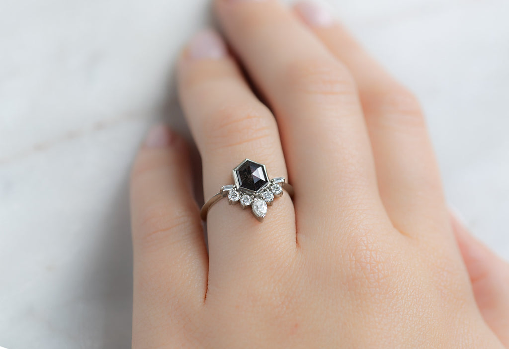 The Posy Ring with a Black Hexagon Diamond on Model