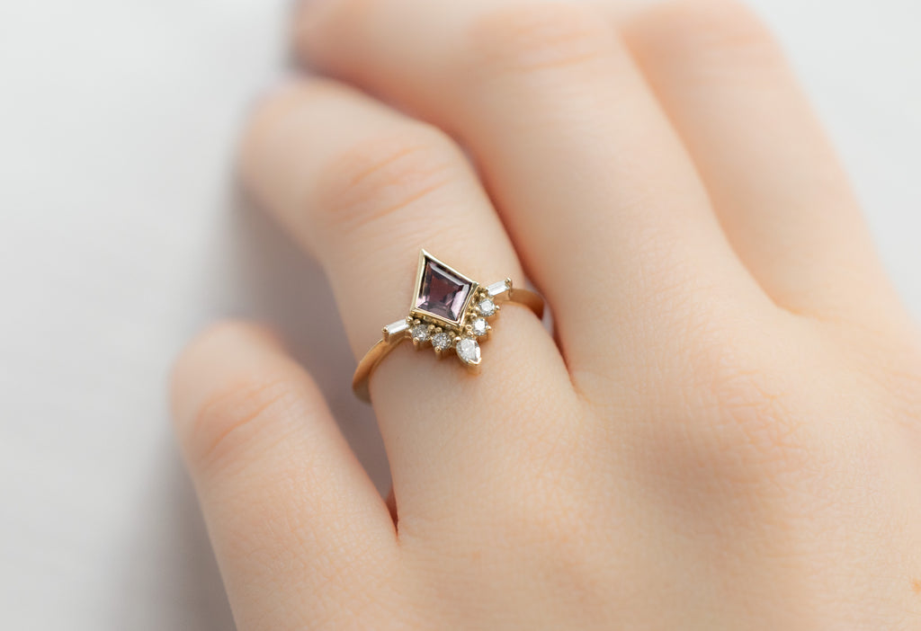 The Posy Ring with a Kite-Shaped Violet Sapphire on Model