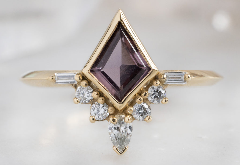 The Posy Ring with a Kite-Shaped Violet Sapphire