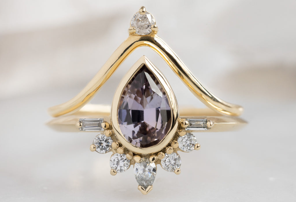 The Posy Ring with a Pear-Cut Tanzanite with Diamond Crown Stacking Band