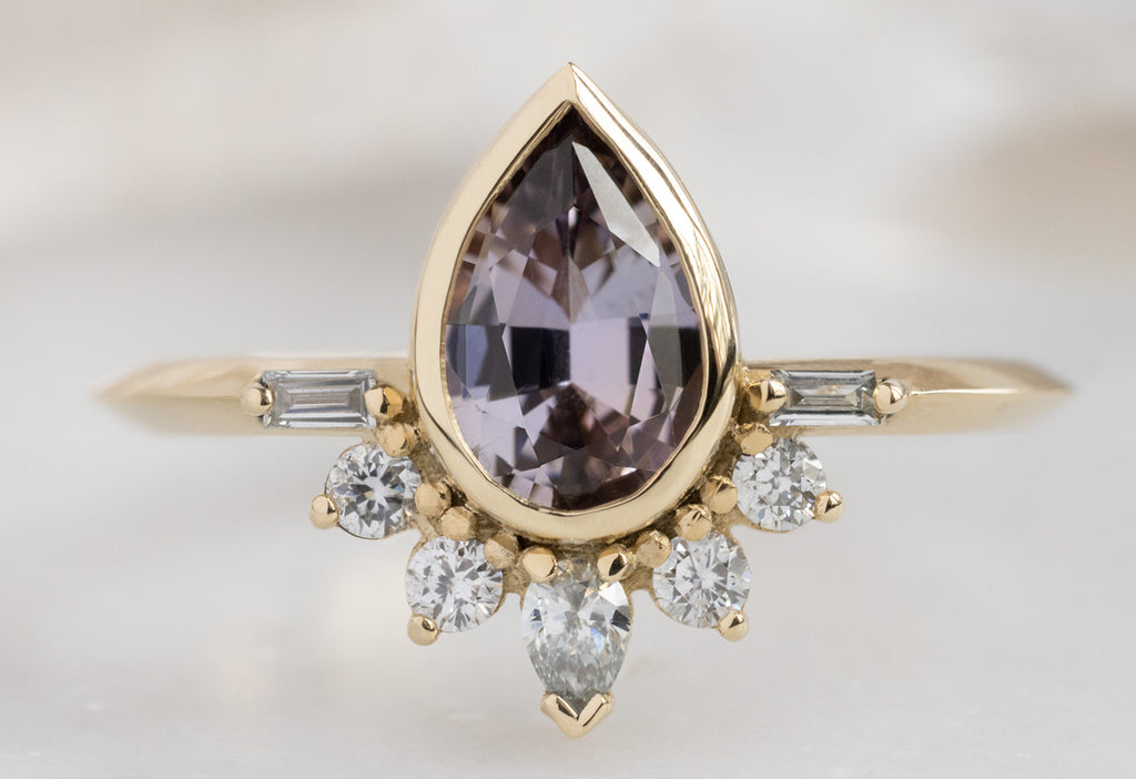 The Posy Ring with a Pear-Cut Tanzanite