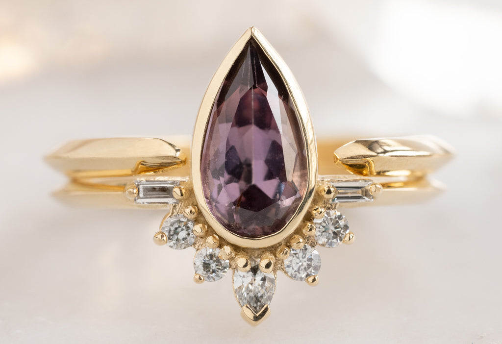 The Posy Ring with a Pear-Cut Violet Sapphire with Open CUff Knife-Edge STacking Band