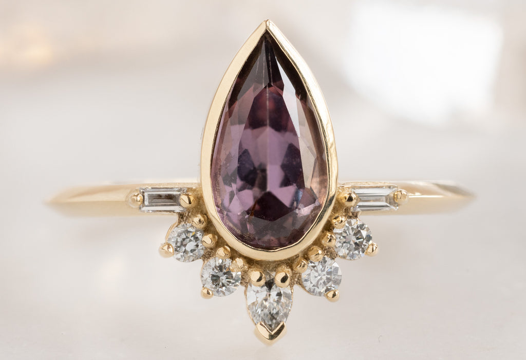 The Posy Ring with a Pear-Cut Violet Sapphire