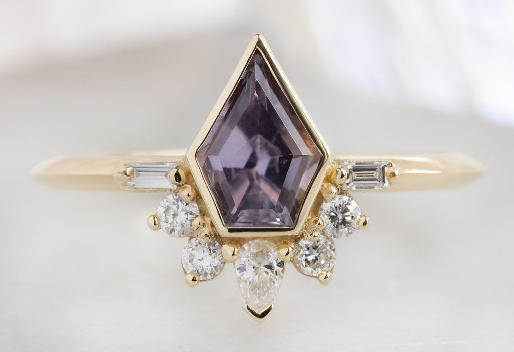 The Posy Ring with a Shield-Cut Violet Sapphire