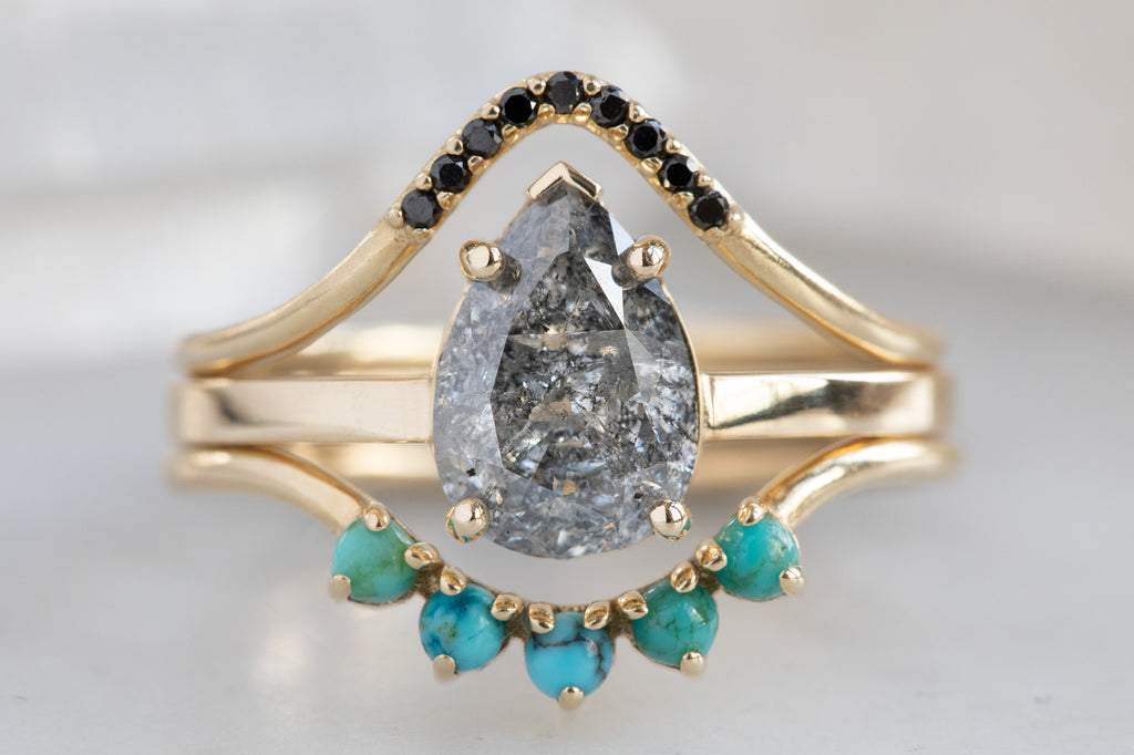 The Sage Ring With A Pear-Cut Salt and Pepper Diamond With Stacking Bands
