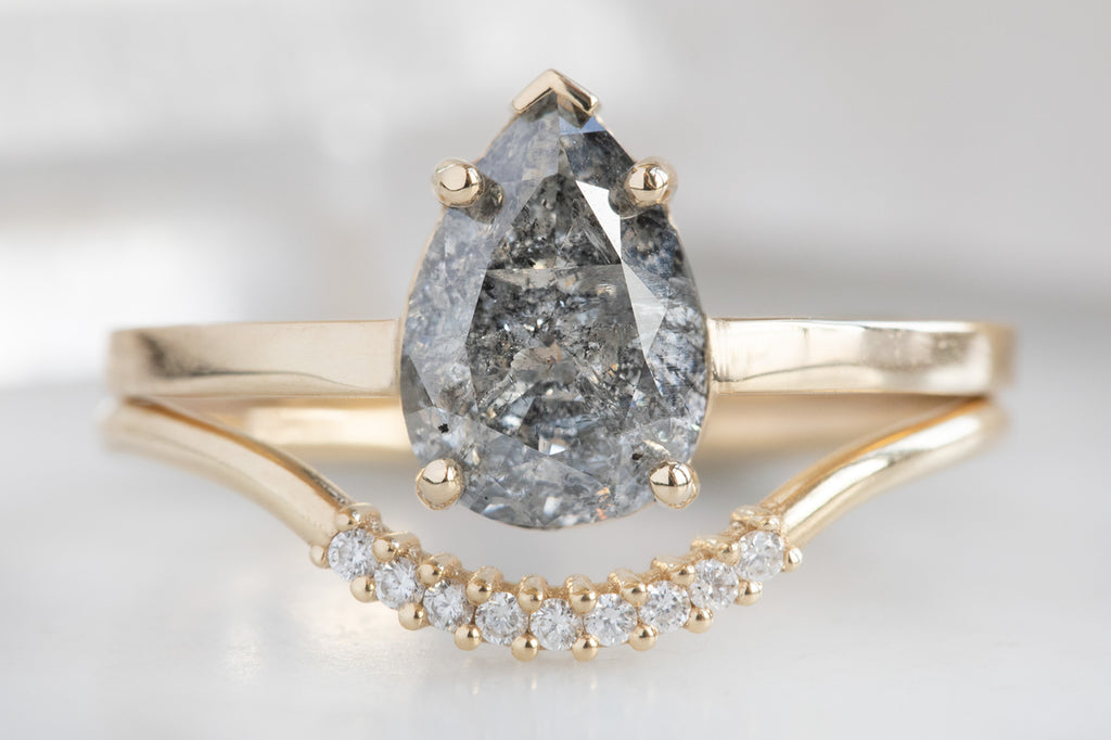 The Sage Ring With A Pear-Cut Salt and Pepper Diamond With Stacking Band