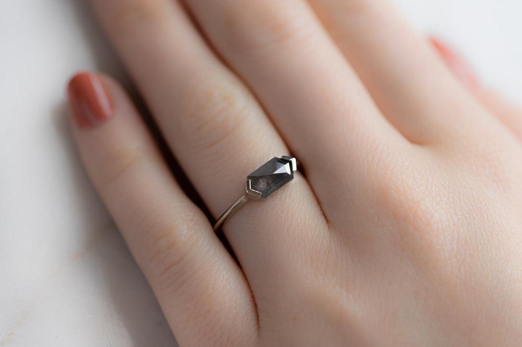The Sage Ring with a Black Hexagon Diamond on Model
