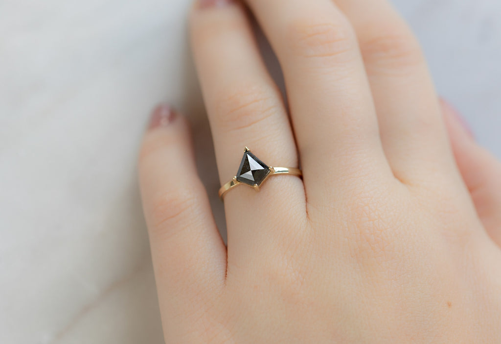The Sage Ring with a Black Kite Shaped Diamond on Model