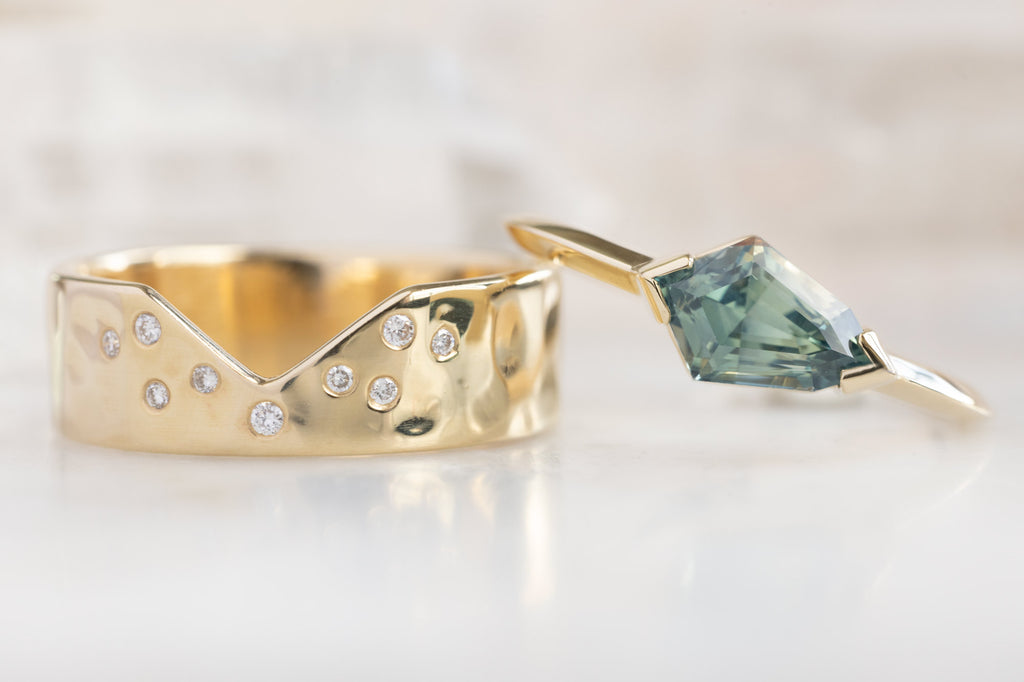 The Sage Ring with a Geometric Sapphire with GOld Cut Out Band