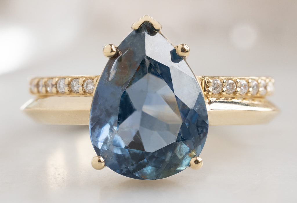 The Sage Ring with a Pear-Cut Sapphire with Open Cuff Pavé Stacking Band