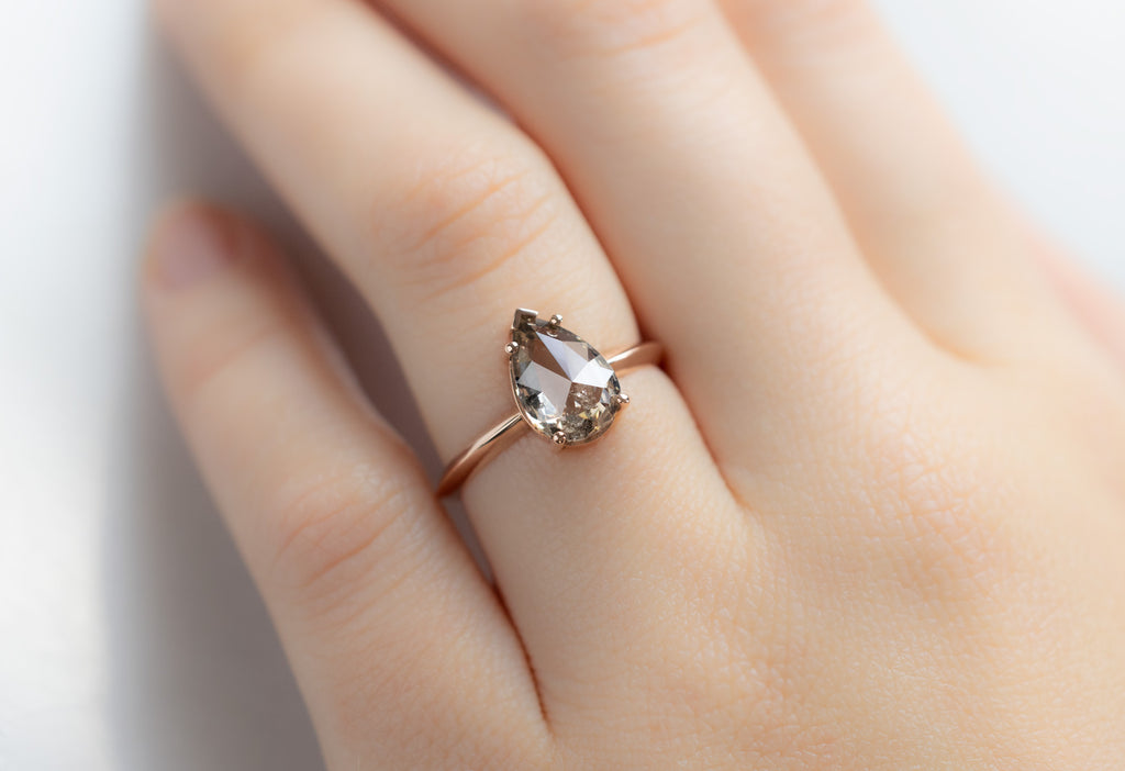 The Sage Ring with a Rose-Cut Champagne Diamond on Model