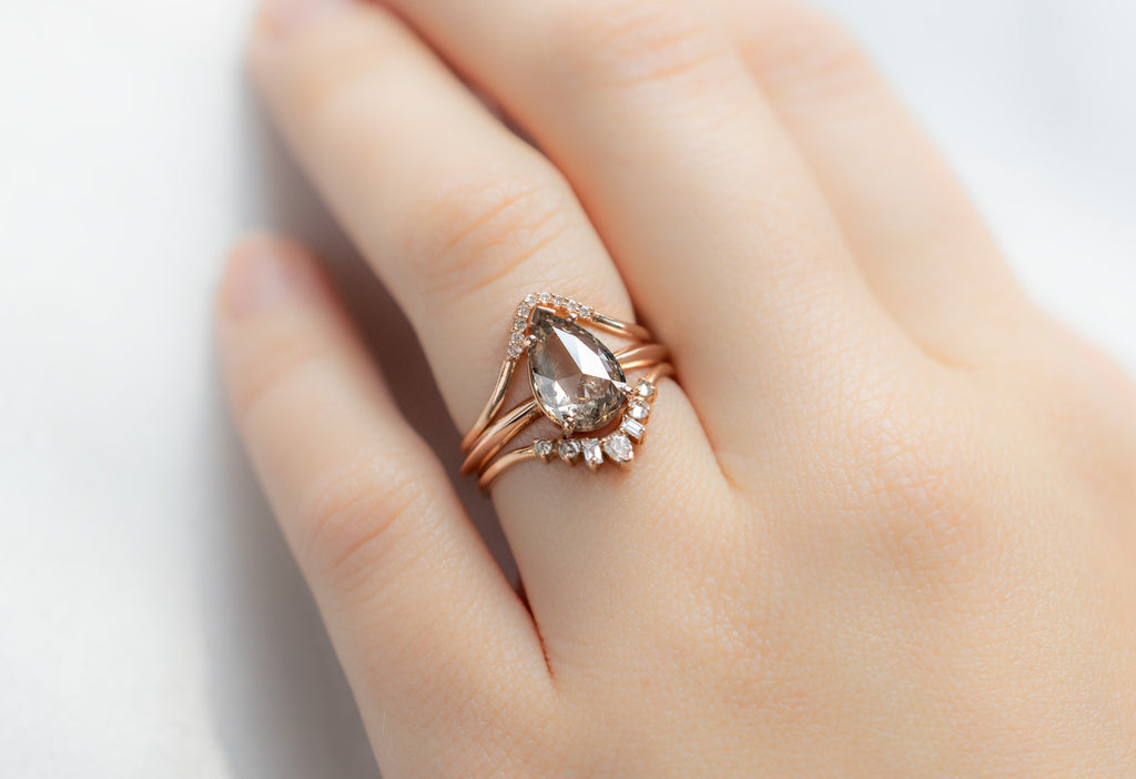 The Sage Ring with a Rose-Cut Champagne Diamond with White Diamond Stacking Bands on Model