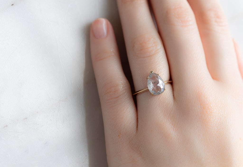 The Sage Ring with a Rose-Cut Icy White Diamond on Model