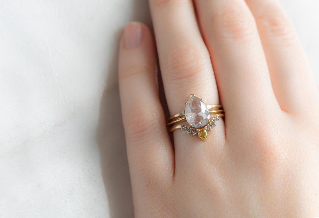 The Sage Ring with a Rose-Cut Icy White Diamond with Stacking Bands on Model