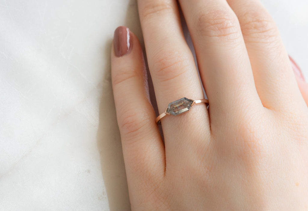 The Sage Ring with a Salt and Pepper Hexagon Diamond on Model