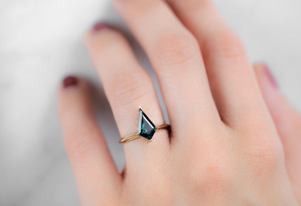 The Sage Ring with a Spinel Kite on Model