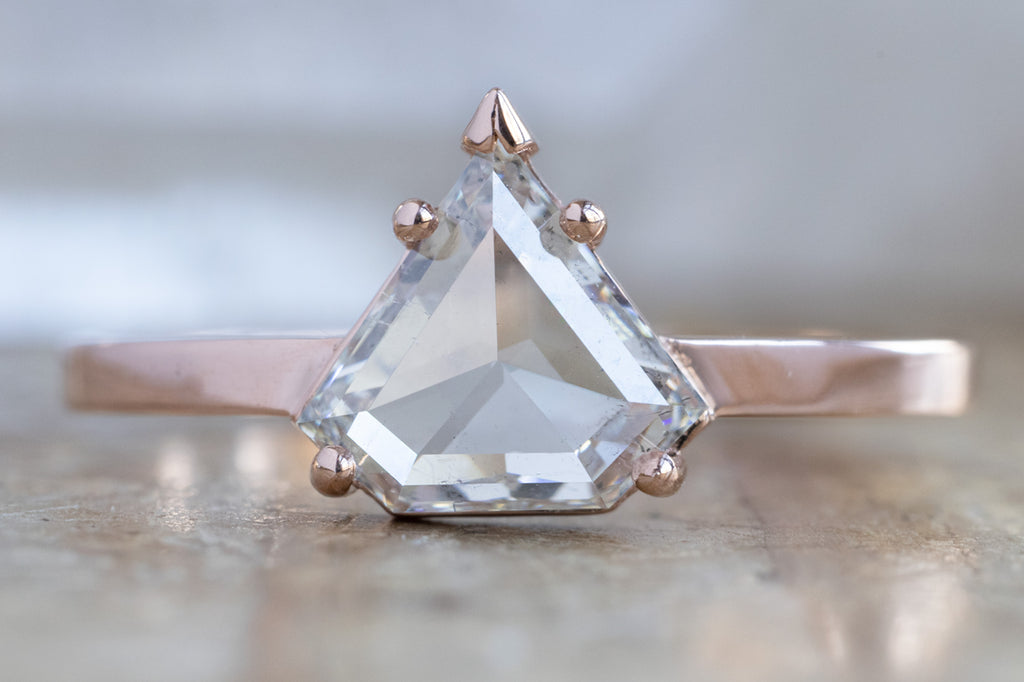 The Sage Ring with a White Shield Cut Diamond