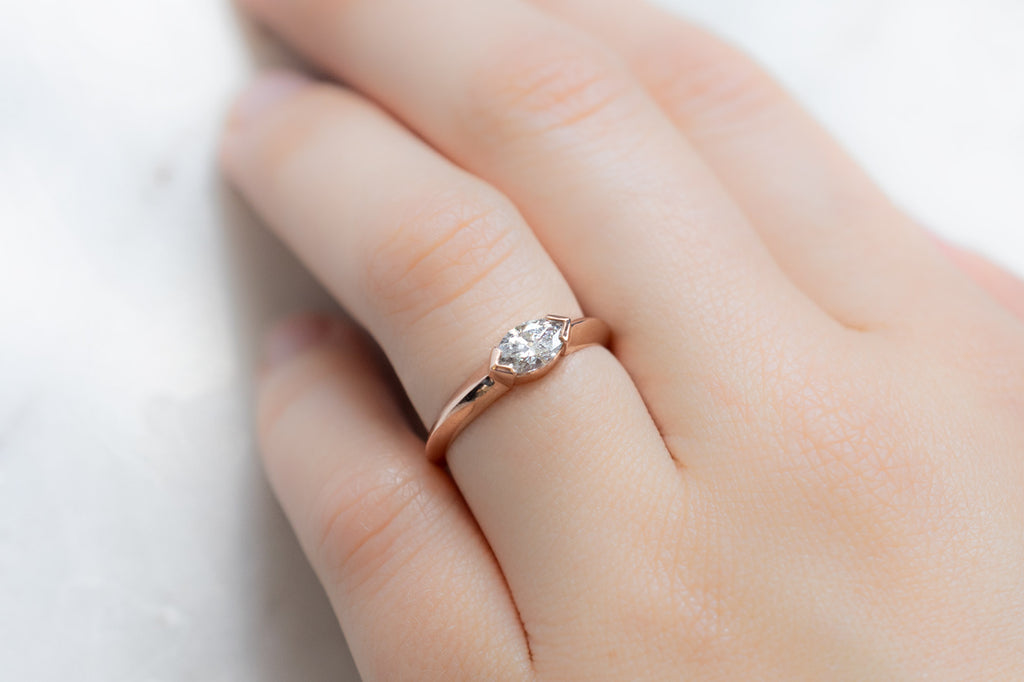 The Signet Ring with a Salt and Pepper Marquise Diamond on Model