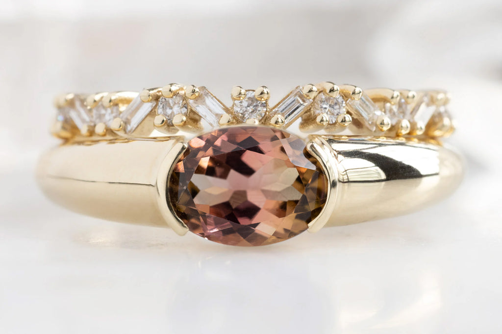 The Signet Ring with an Oval-Cut Bicolor Tourmaline with Baguette Confetti Stacking Band