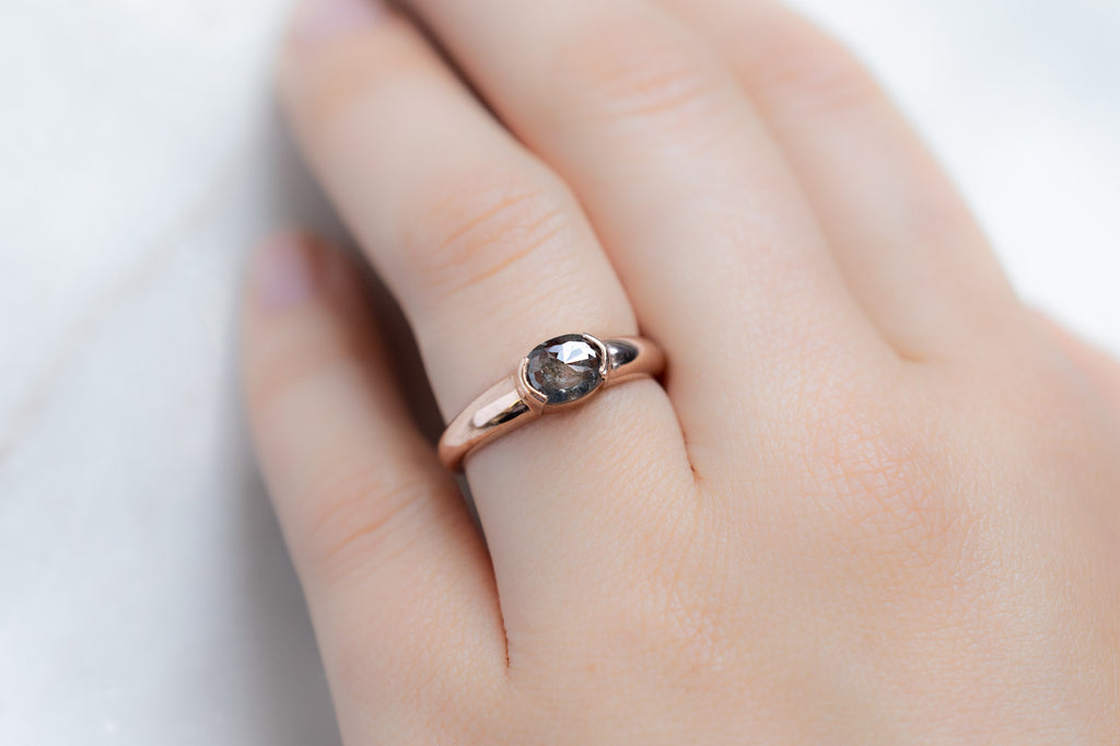 The Signet Ring with an Oval-Cut Salt and Pepper Diamond on Model