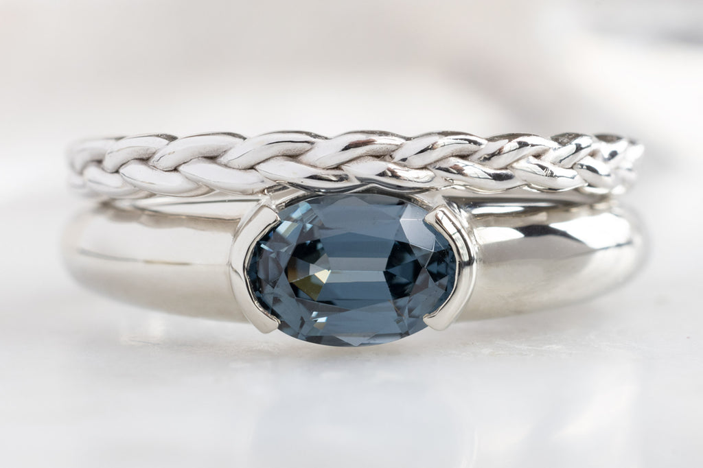 The Signet Ring with an Oval-Cut Spinel with Braided Stacking Band