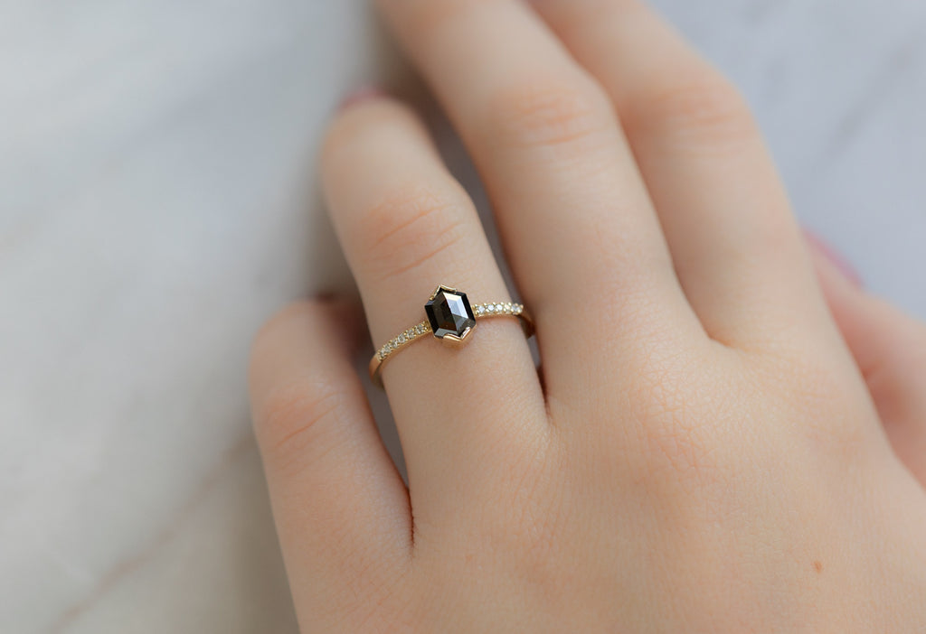 The Willow Ring with a Black Hexagon Diamond on Model