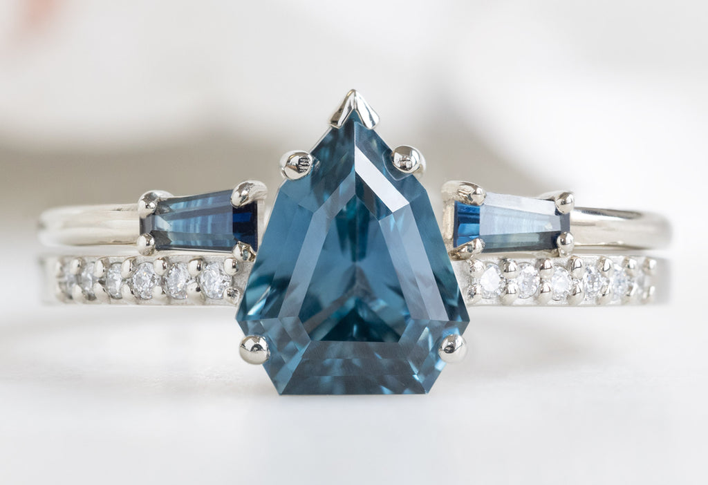 The Willow Ring with a Geometric Sapphire with Open Cuff Montana Sapphire Baguette Stacking Band