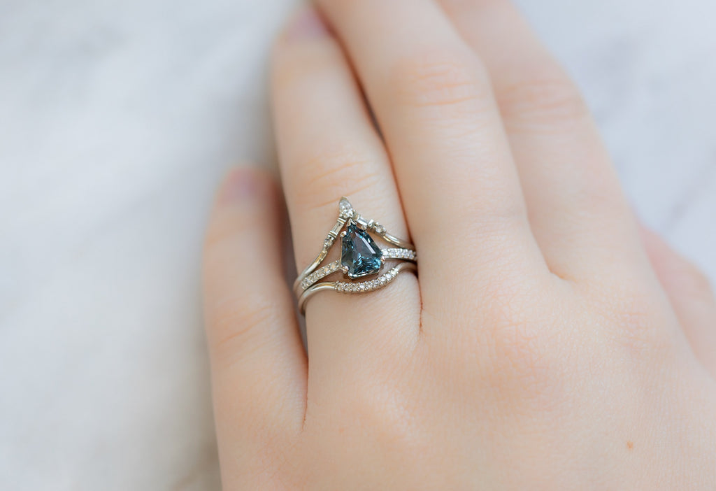 The Willow Ring with a Geometric Sapphire with White Diamond Stacking Bands on Model