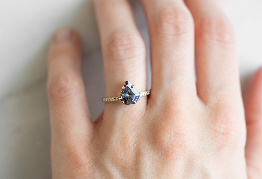 The Willow Ring with a Geometric Tanzanite on Model