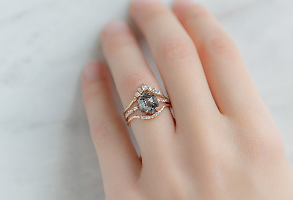 The Willow Ring with a Salt and Pepper Hexagon Diamond with White Diamond Stacking Bands on Model