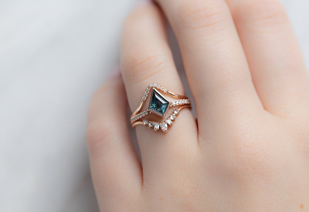 The Willow Ring with a Kite-Shaped Montana Sapphire with White Diamond Stacking Bands on Model