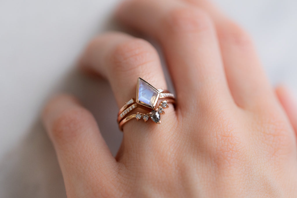 The Willow Ring with a Kite-Shaped Moonstone with Stacking Bands on Model