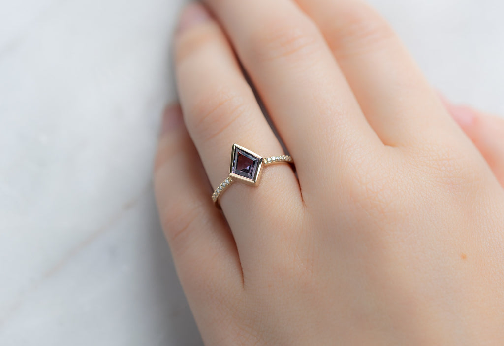 The Willow Ring with a Kite Shaped Purple Sapphire on Model