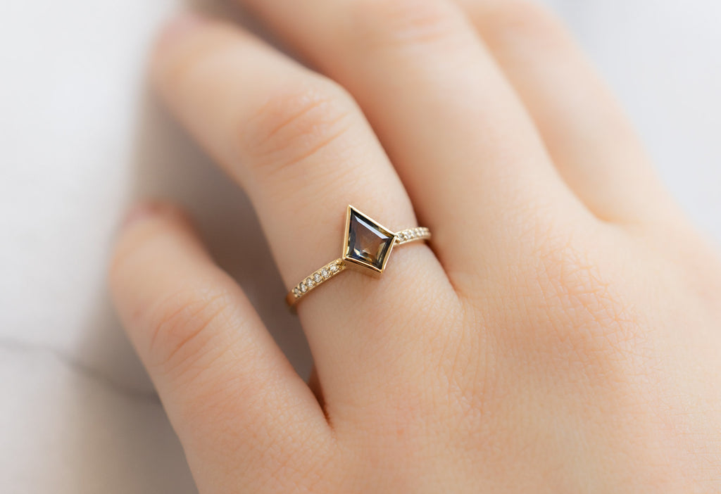 The Willow Ring with a Parti Montana Sapphire on Model