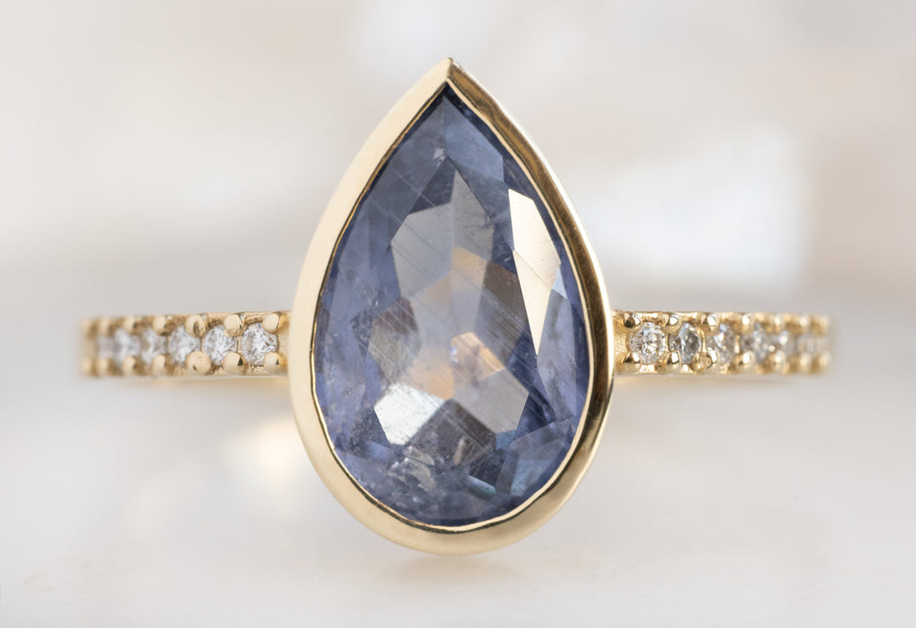 The Willow Ring with a Pear-Cut Blue Violet Sapphire