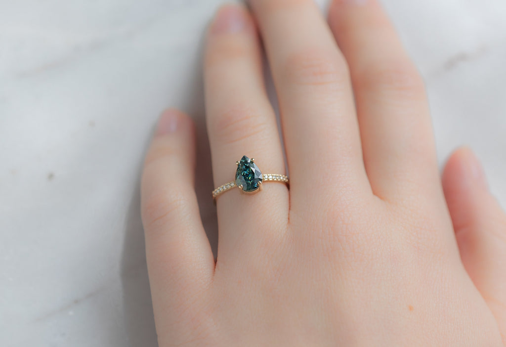 The Willow Ring with a Pear-Cut Montana Sapphire on Model