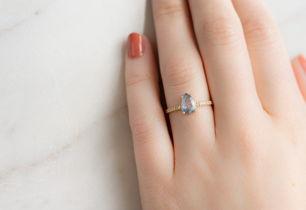 The Willow Ring with a Pear-Cut Montana Sapphire on Model
