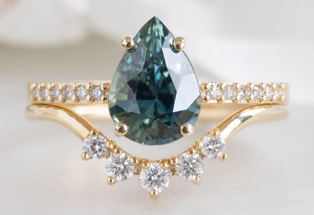 The Willow Ring with a Pear-Cut Montana Sapphire with Round Diamond Sunburst Stacking Band