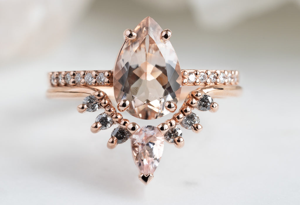 The Willow Ring with a Pear-Cut Morganite with Stacking Bands