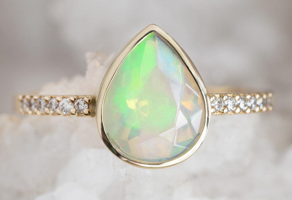 The Willow Ring with a Pear-Cut Opal on White Crystal