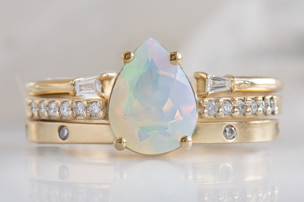 The Willow Ring with a Pear-Cut Opal With Stacking Bands